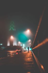 Illuminated street at night