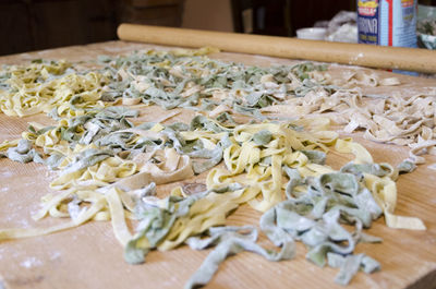 Tagliatelle on wooden table