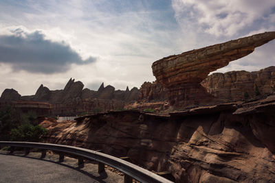 Idyllic shot of rock formation against sky