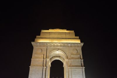 Low angle view of historical building against sky at night