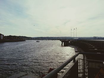 View of river against cloudy sky