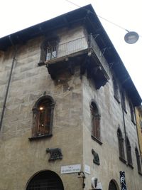 Low angle view of old building against sky