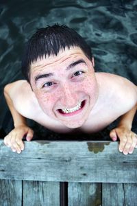 Portrait of smiling man in lake