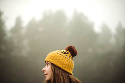 Portrait of woman looking at camera