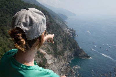 Rear view of woman looking at sea