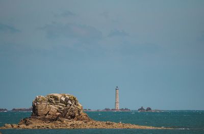 Scenic view of sea against blue sky