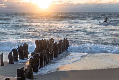 Scenic view of sea at sunset