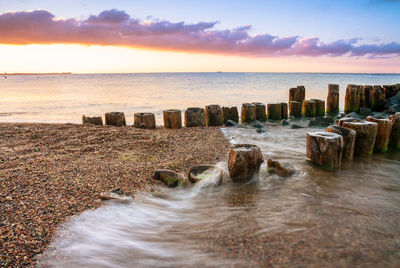 Scenic view of sea against sky during sunset