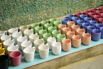 High angle view of cups for sale at market stall