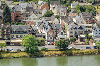 Town by sea against sky