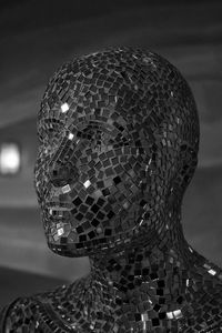 Close-up of mosaic glass mannequin