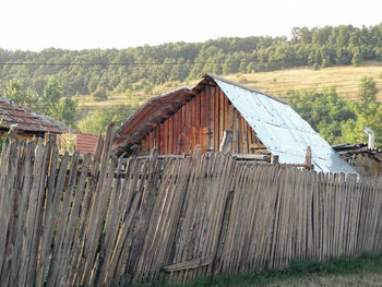 Old wooden structure on field