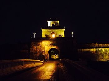 Illuminated road at night