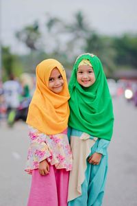 Portrait of innocent girls wearing hijabs