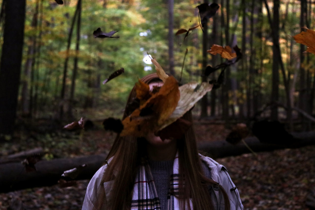 MAN IN FOREST DURING HALLOWEEN