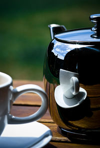 Close-up of coffee cup on table