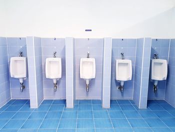 Urinals in public restroom