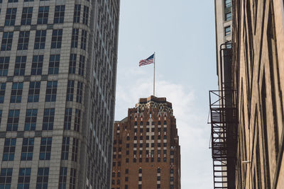 Low angle view of flag against sky