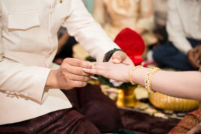 Close-up of hand holding bouquet