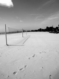 Footprints on sandy beach