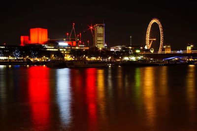 Illuminated city lit up at night