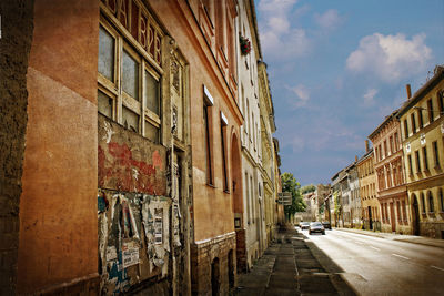 Street in city against sky