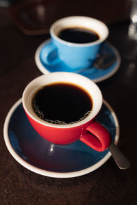 High angle view of coffee cup on table