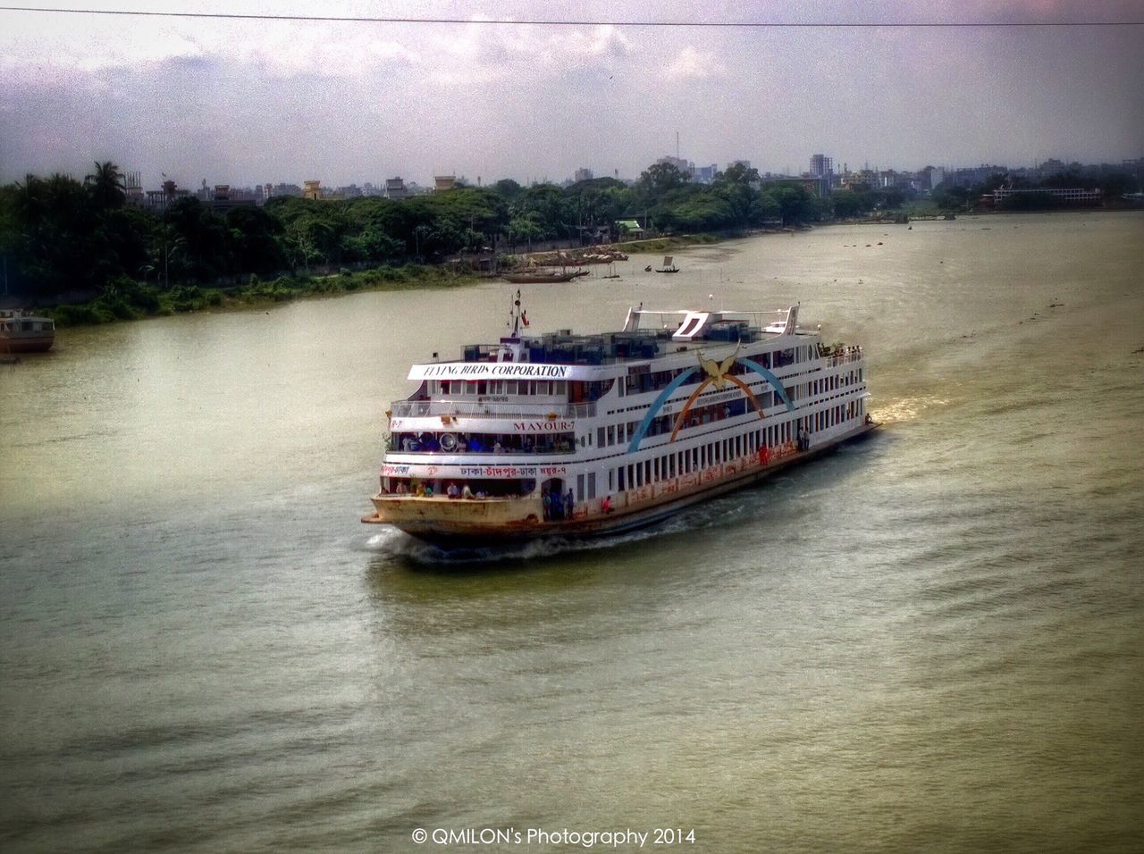 transportation, nautical vessel, mode of transport, water, boat, waterfront, moored, river, sky, lake, travel, nature, built structure, tranquil scene, reflection, outdoors, tree, tranquility, day, no people