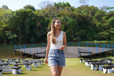 Beautiful girl walking in goiania park, brazil