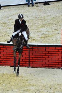Full length of men standing on zebra crossing