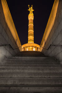 Low angle view of statue at night