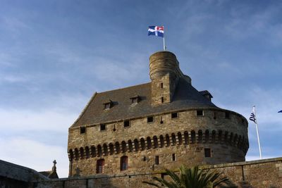  the château of duchess anne a historic site and you can see the flag of saint-malo with the ermine