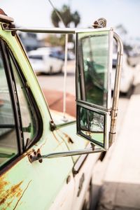 Reflection of car on side-view mirror