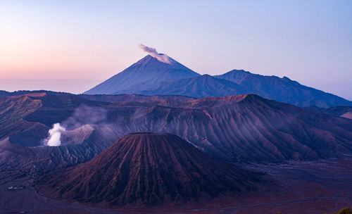 Scenic view of volcanic mountain against sky