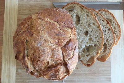 High angle view of bread on cutting board