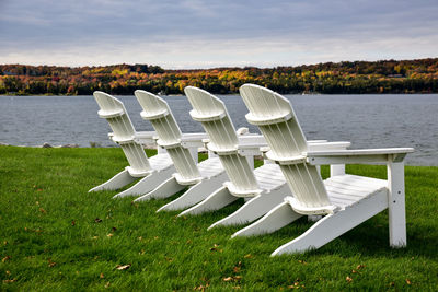 Lounge chairs on lakeshore