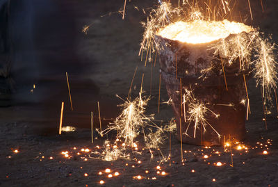 Sparks emitting from molten iron