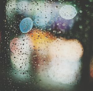 Close-up of water drops on glass