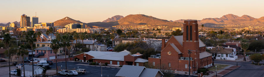 Tucson skyline at dawn with morning sun lighting the mountains