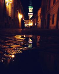 Illuminated street light at night