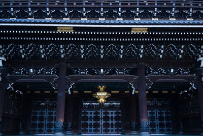 Low angle view of illuminated statue in building