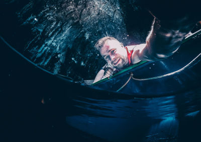 Portrait of man swimming in sea