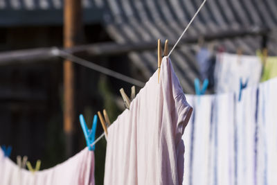 Low angle view of clothes drying on rack