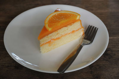 Close-up of cake slice in plate on table