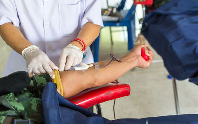 Cropped image of person during blood donation