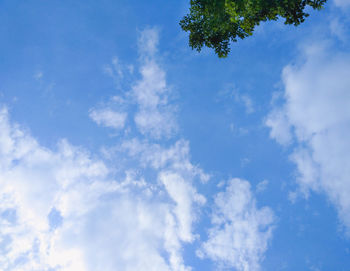 Low angle view of clouds in blue sky