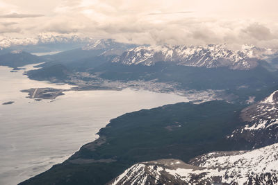 Aerial view of landscape and mountains against sky