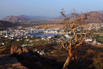 High angle view of residential district and mountains