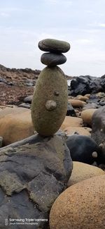 Close-up of stone stack on rock