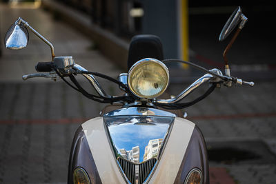 Close-up of bicycle parked on street